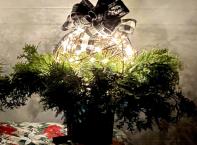 Gift certificte for a Christmas planter pot featuring a light up ball, with your choice of ribbon colour.