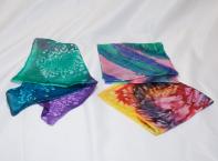 3 multi-coloured hand-painted artisan pocket squares. 100% silk. Different designs dimensions: about 28 cm x 28 cm