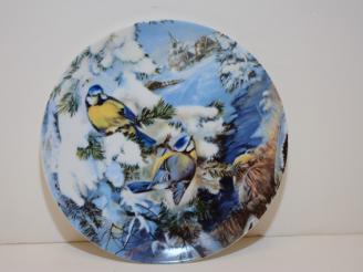  Birds in Winter Collectors Plate donated by Rotary Club Member.